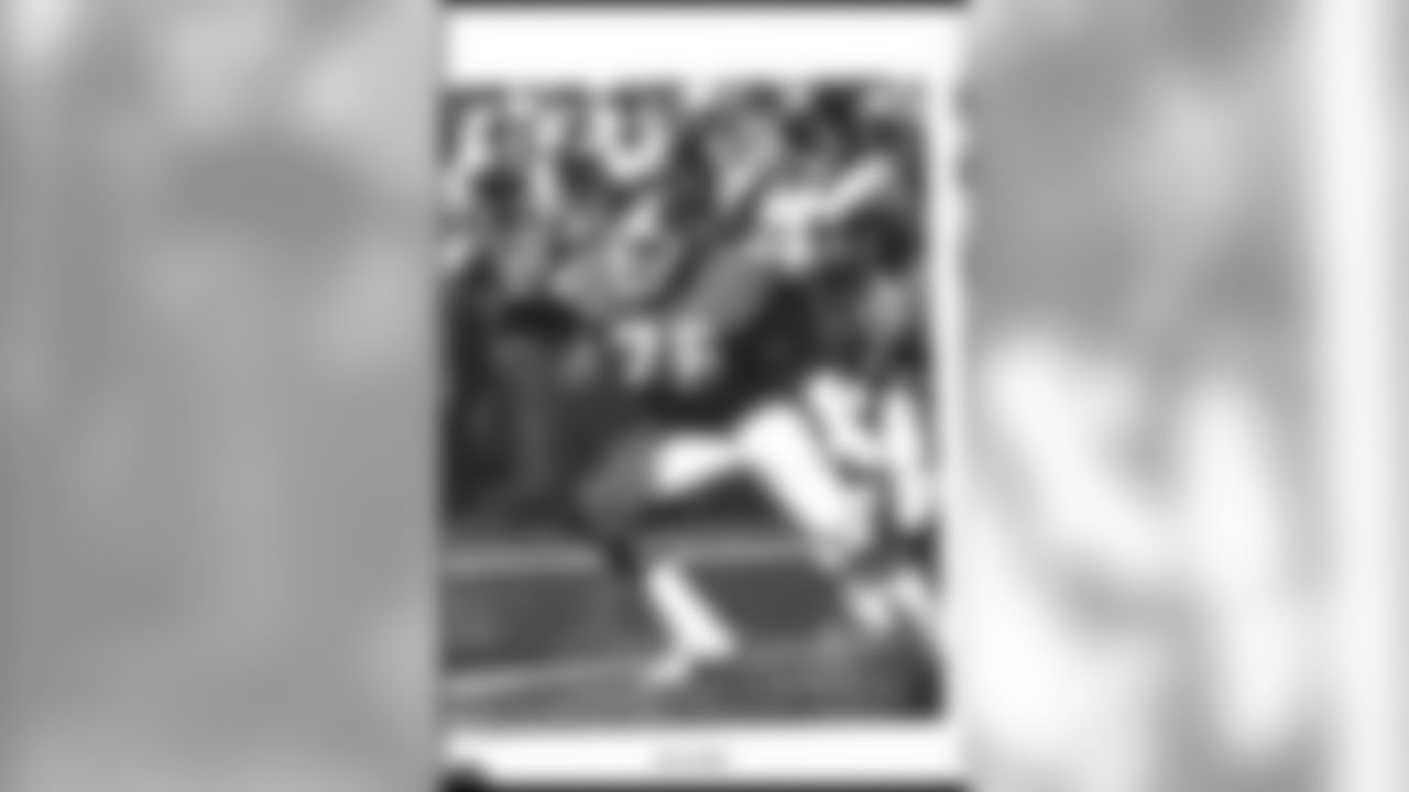 Ken Lanier (1981 NFL Draft - fifth round, 125th overall) reaches to make a block on a pass rusher. Lanier played all but one year of his 14-year career with the Broncos, starting 165 of 177 games.