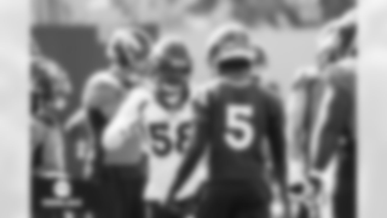Von Miller and Teddy Bridgewater during practice at UCHealth Training Center in Englewood, Colorado on September 17, 2021. (Photo by Ben Swanson)