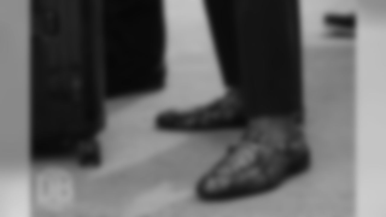 Fashionable shoes on the tarmac at Denver International Airport during the team's travel for their preseason game against the Washington Redskins on August 23, 2018.