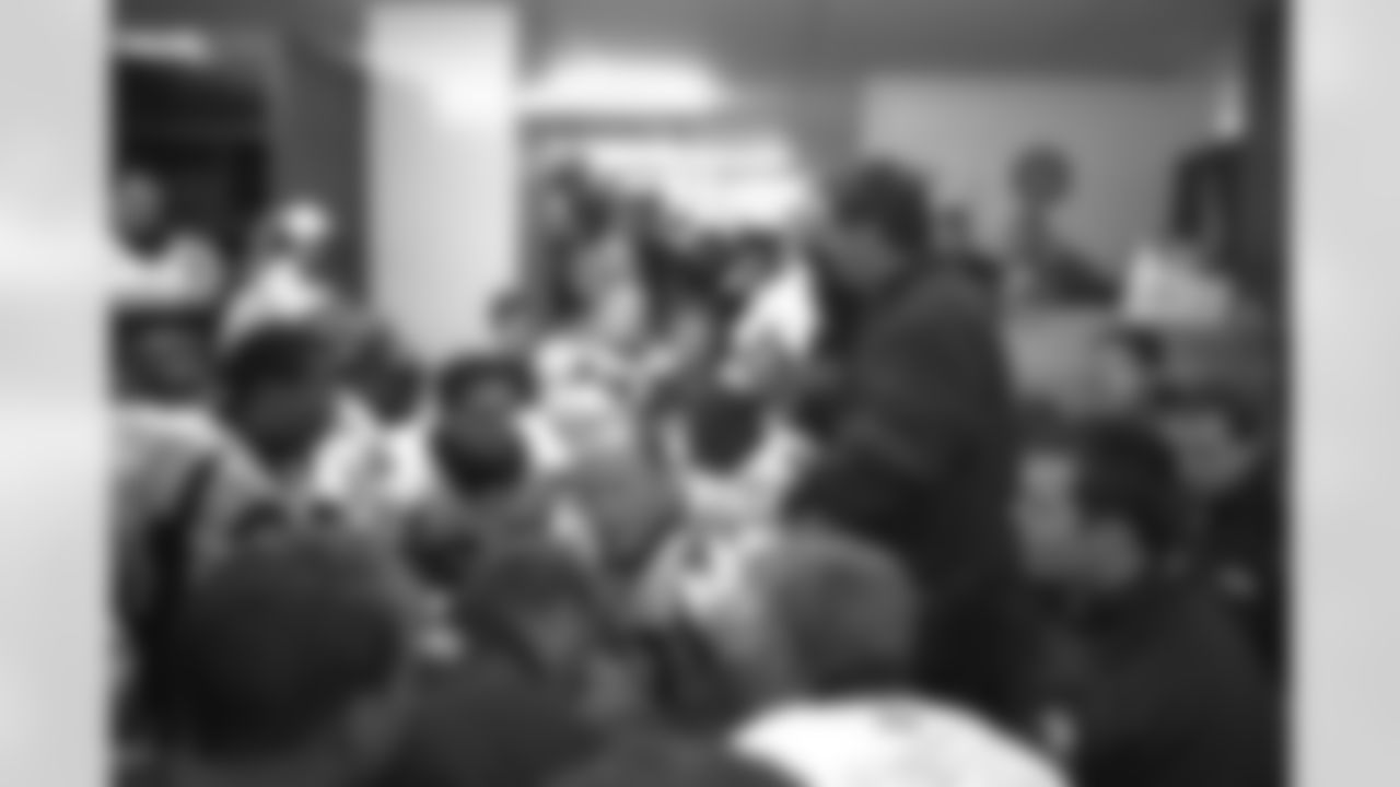 Kansas City: Head Coach Mike Shanahan addresses the team in the locker room after the Broncos win their second round playoff game against the Kansas City Chiefs at Arrowhead Stadium in Kansas City, MO on January 4, 1998.