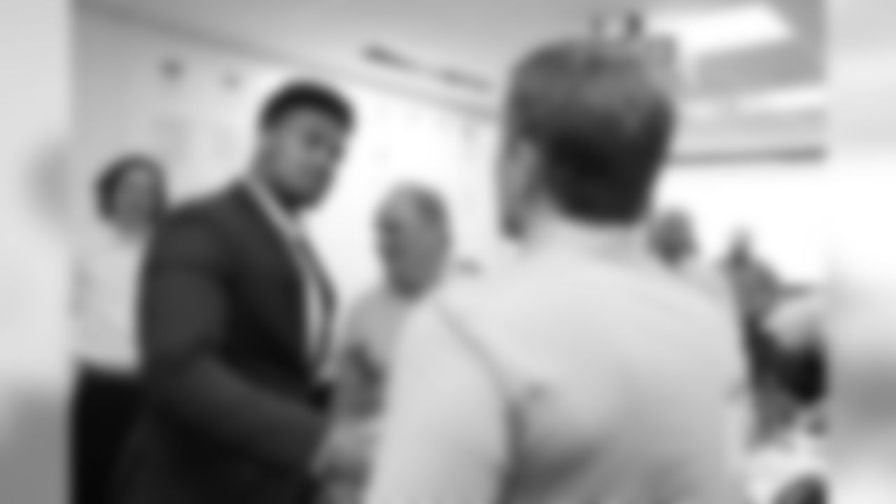 Dre'Mont Jones greets Director of Team Administration Mark Thewes during the arrival tour for Day 2 picks at UCHealth Training Center on April 27, 2019 after the Broncos drafted them in the 2019 NFL Draft.