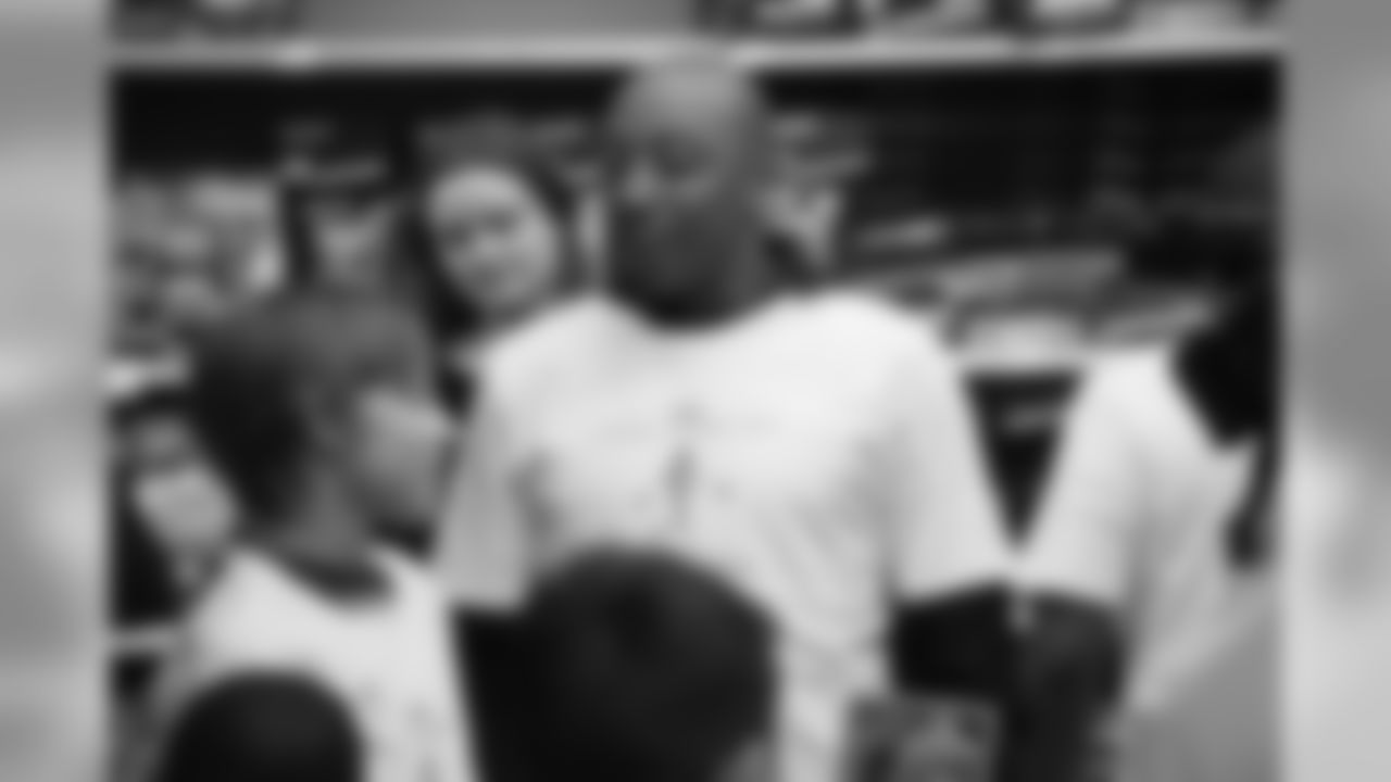 Chris Harris Jr. hosts his 2018 "Shop with a Jock" event, in which he gives 50 children a shopping spree and dinner.