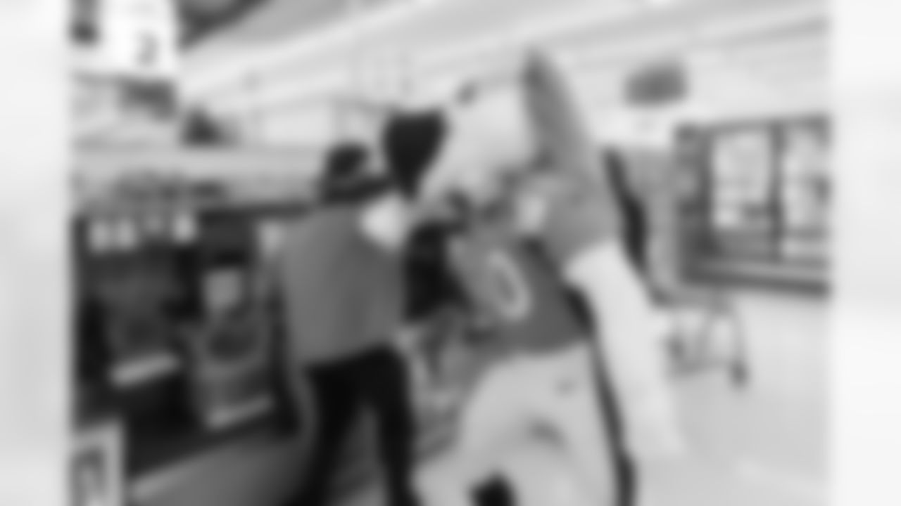 With help from Miles the mascot and Denver Broncos Cheerleaders, the Broncos gave away a total of $10,000 in groceries to Broncos fans at a King Soopers in Federal Heights, Colorado on January 3, 2021. (Photo by Ben Swanson)