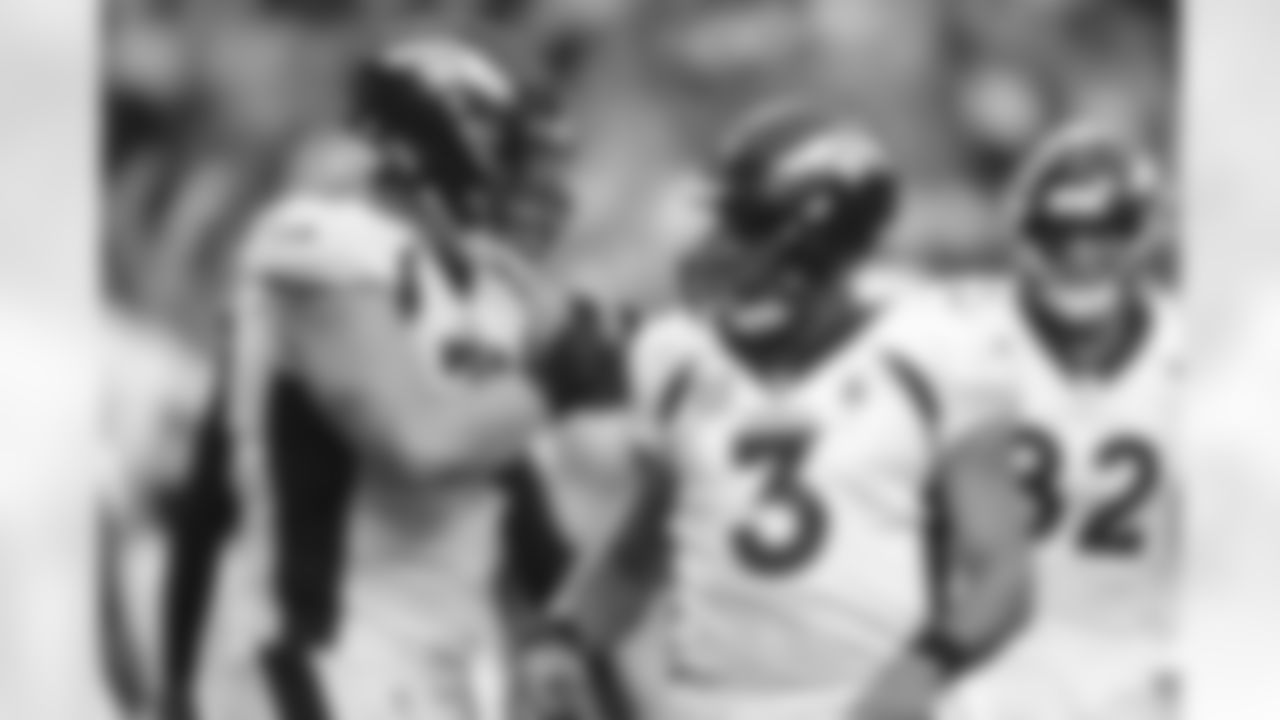 Denver Broncos offensive tackle Garett Bolles (72) and quarterback Russell Wilson (3) react after a touchdown during the NFL Game against the Las Vegas Raiders on Sunday, October 2, 2022 at Allegiant Stadium in Las Vegas, Nevada.
Photo by Joshua Gateley/Denver Broncos