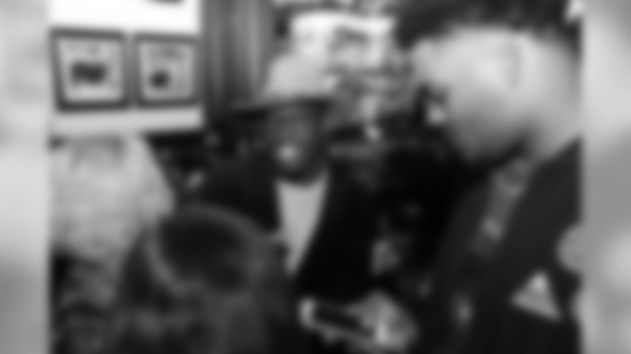 Dymonte Thomas shares a laugh during Shane Ray's 2nd Annual Rays Awareness Steak Dinner at 801 Chophouse in Denver on November 12, 2018.