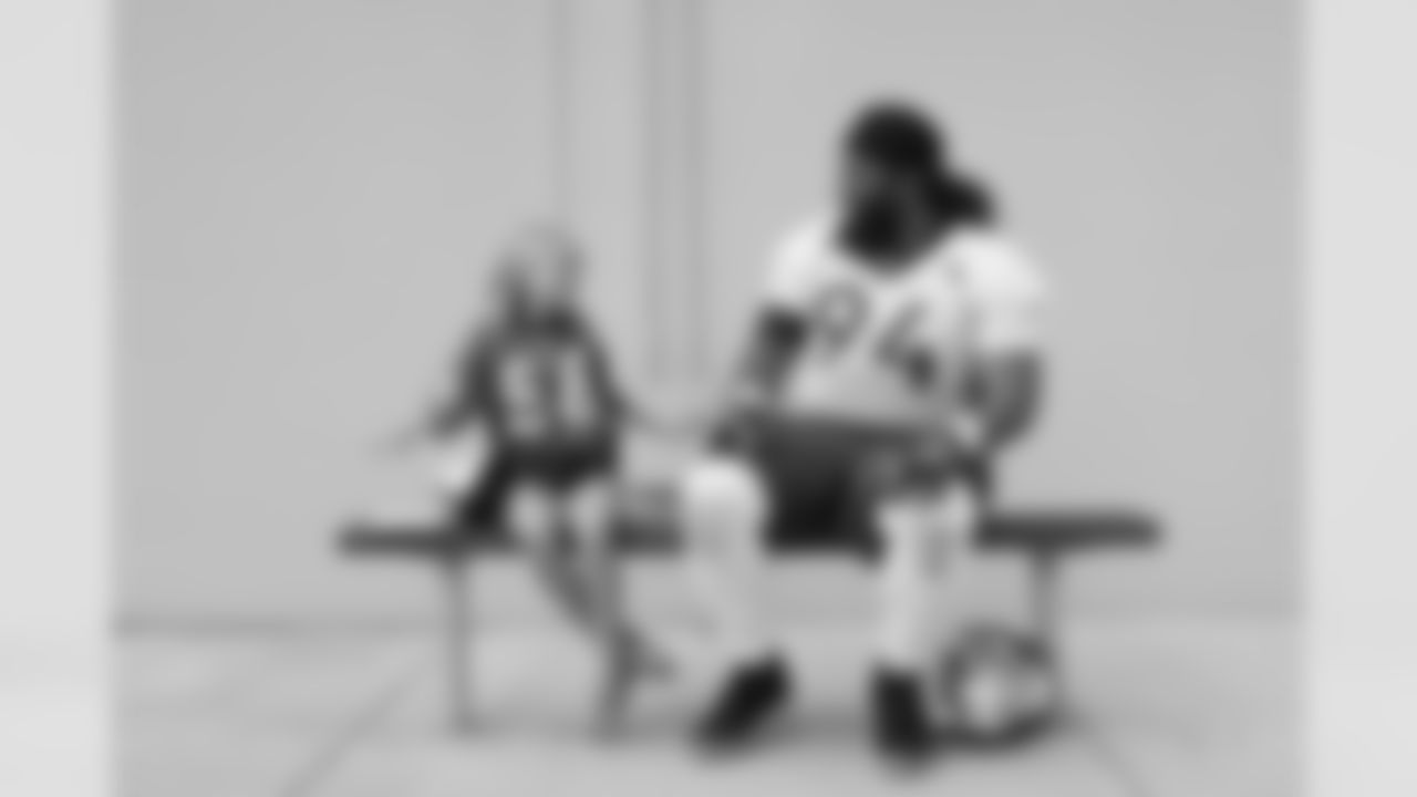 Children's Hospital Colorado junior reporter Kaylea interviews Domata Peko Sr. after practice on September 5, 2018 at UCHealth Training Center.