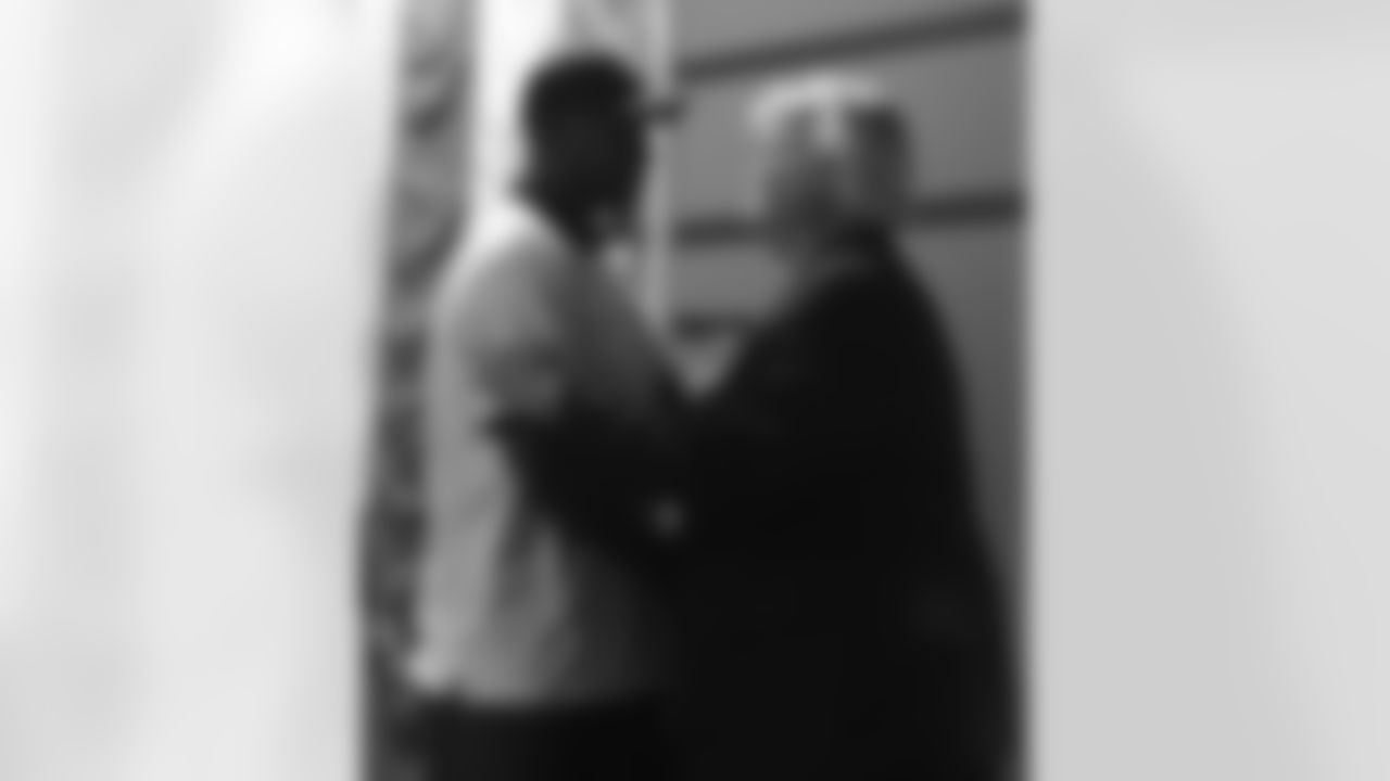 Roever and Florence share a moment after Florence speaks to the crowd.