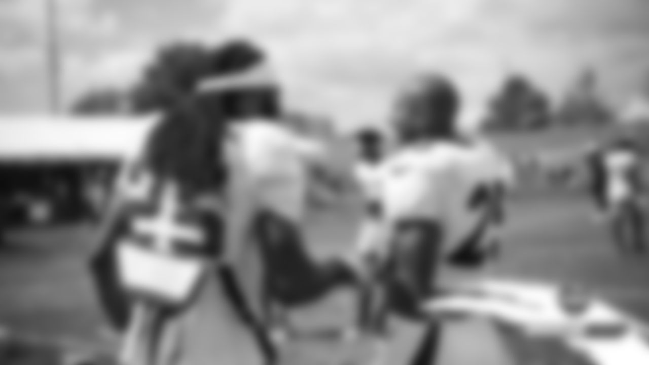 Chris Harris Jr. talks with San Francisco 49ers cornerback Richard Sherman (25) at a joint practice with the San Francisco 49ers on the 20th day of training camp on August 17, 2019.