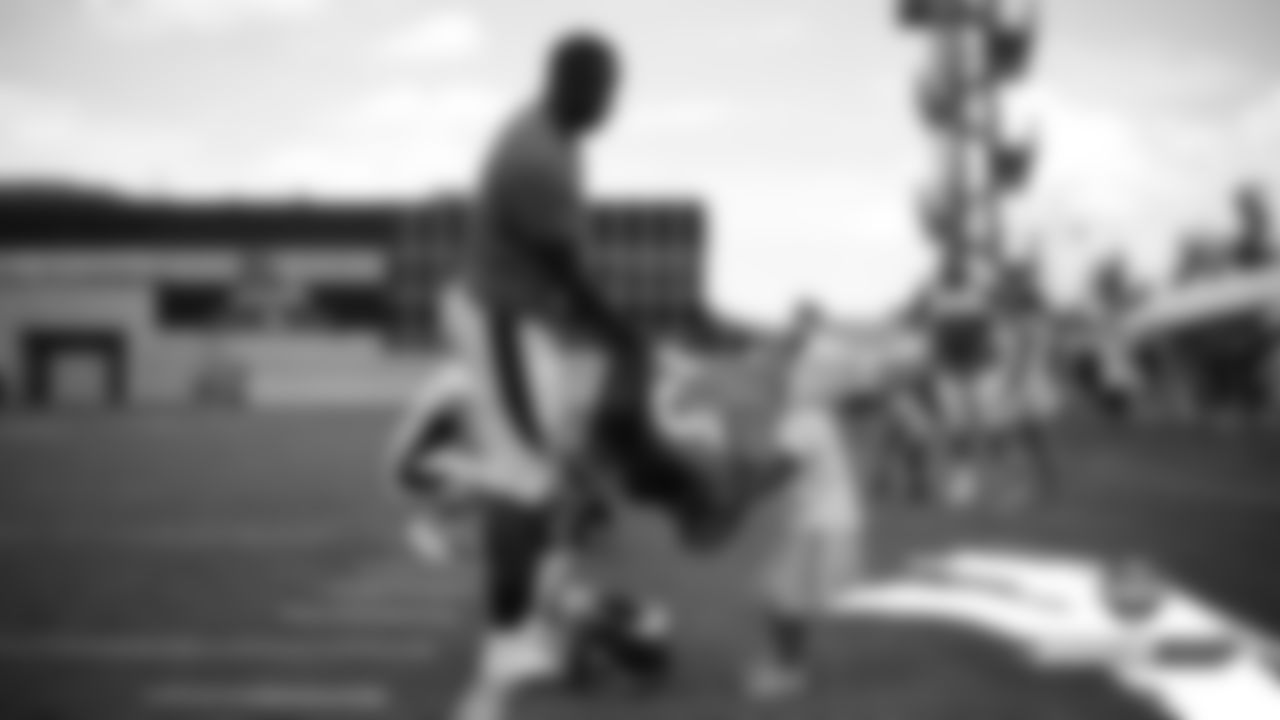 Joe Jones and his daughter, Scarlette, after practice on Day 6 of training camp on July 24, 2019.