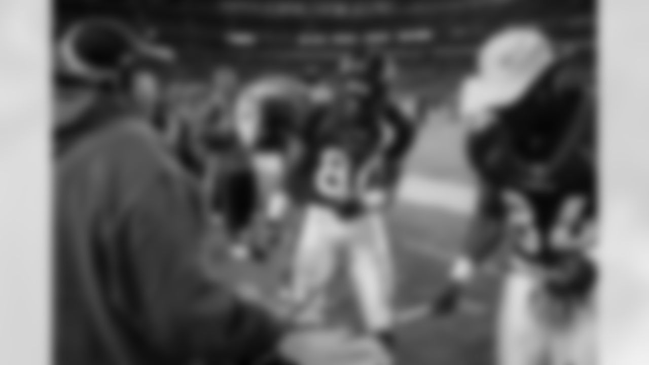 Rod Smith, along with Shannon Sharpe, play a little tune on the Stampede's drums against the Kansas City Chiefs at Invesco Field at Mile High in Denver, CO on December 7, 2003.
