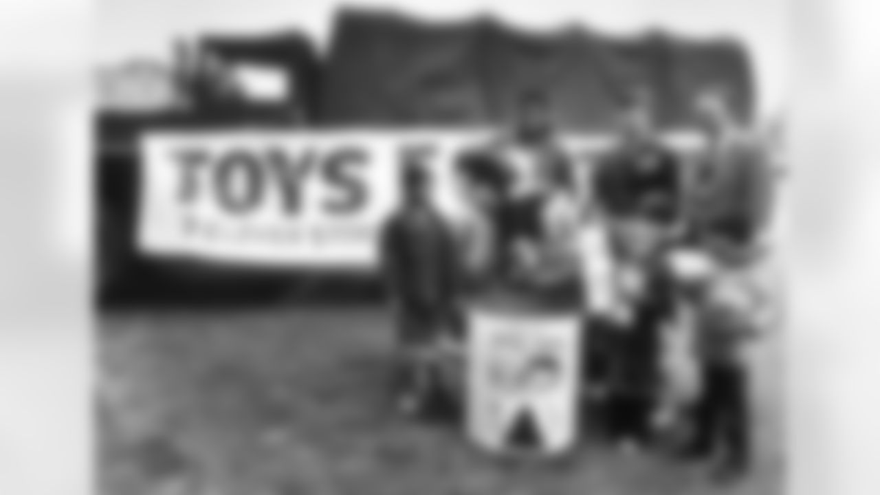 Rick Upchurch with Toys for Tots kids.