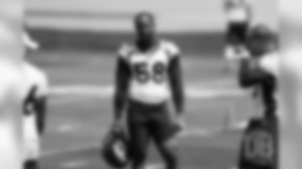 Von Miller listens to drill instructions during the first day of voluntary veteran minicamp on April 16, 2019.