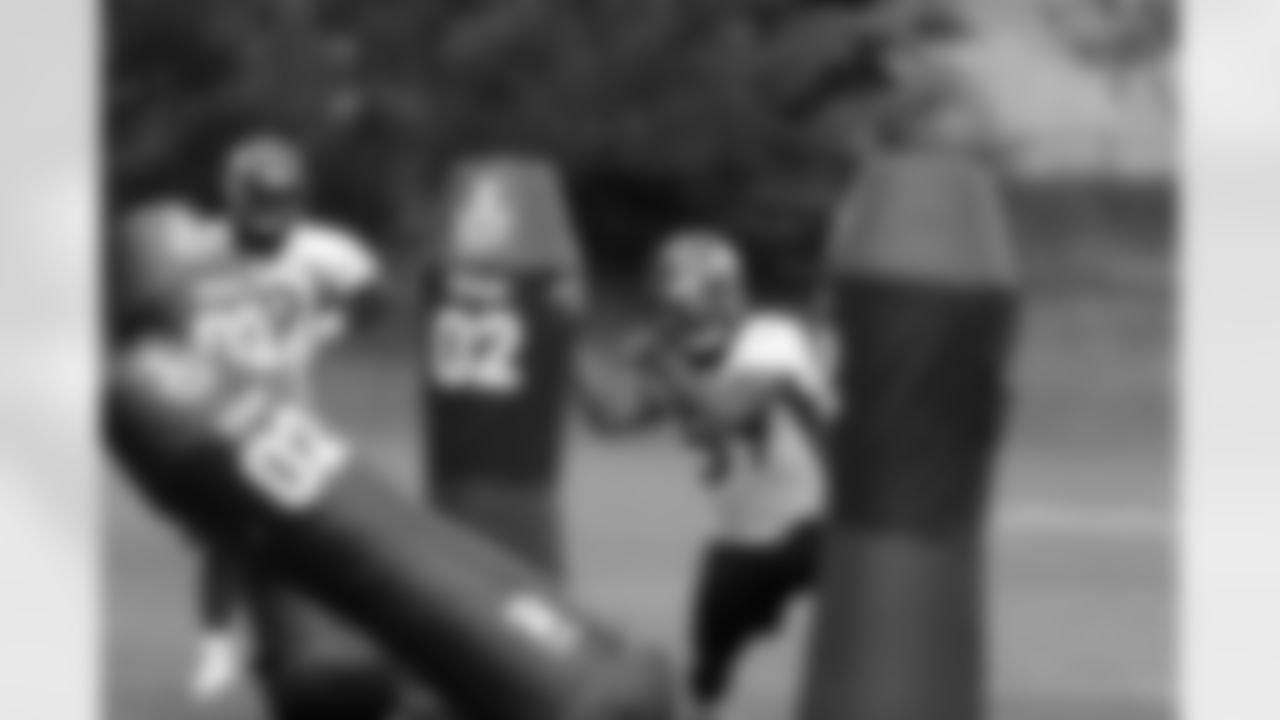 LB Danny Trevathan rips through blocking pads.