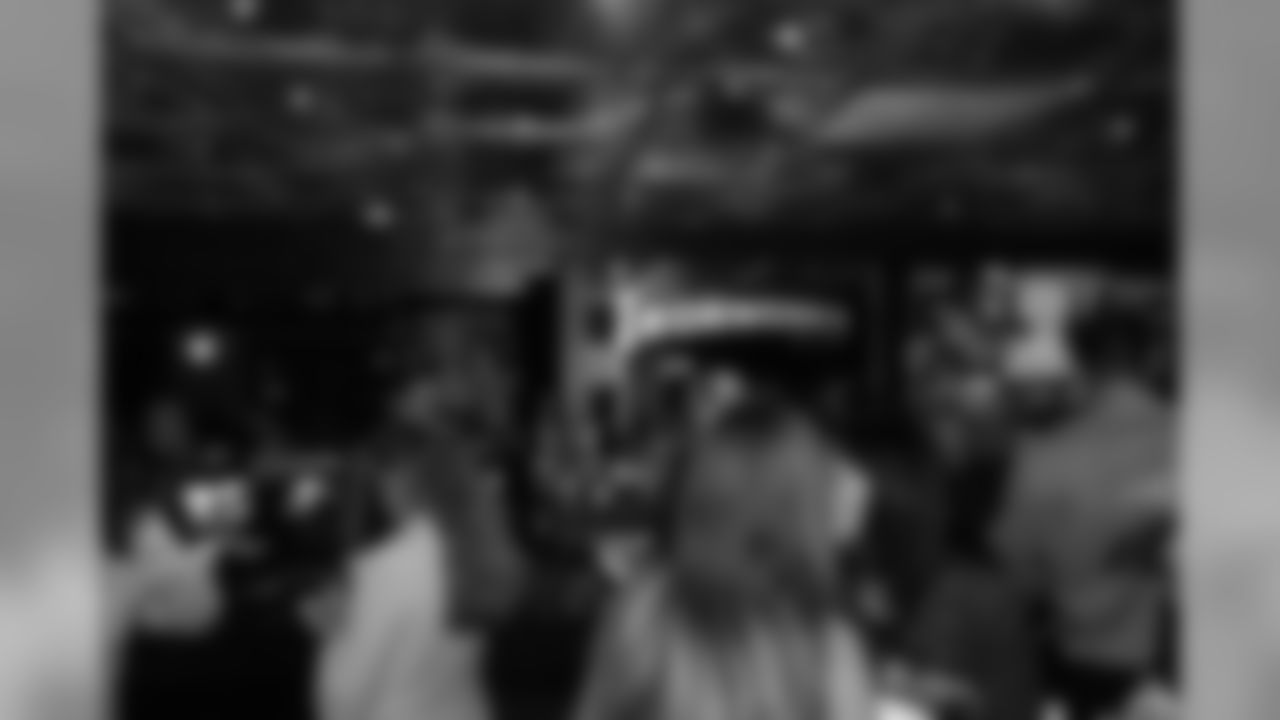 Guests mingle at the bar during Von's Vision at Mile High Station in Denver on November 5, 2018.