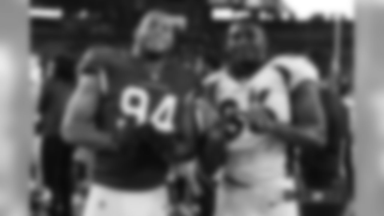 Austin Traylor and Cardinals defensive end Alec James, both former Wisconsin Badgers, after the Broncos' preseason game against the Arizona Cardinals on August 30, 2018.