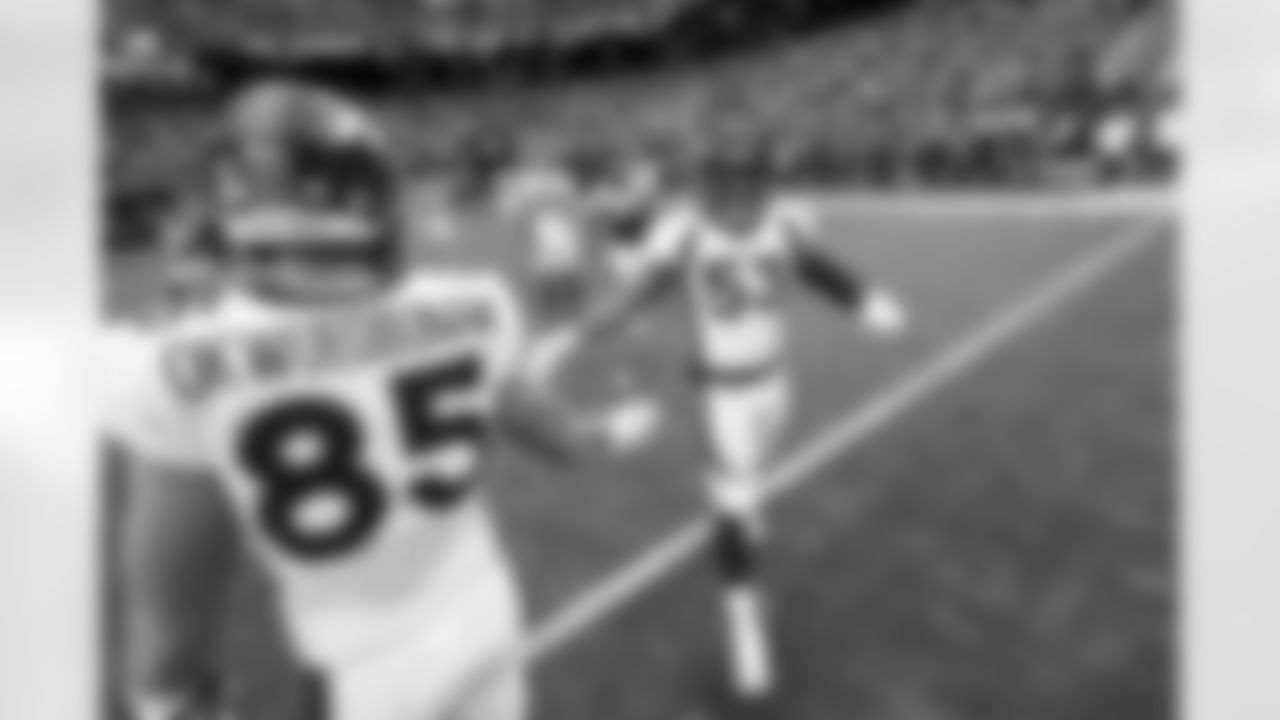 Albert Okwuegbunam and Jonathon Cooper before the Broncos' Week 16 game against the Las Vegas Raiders at Allegiant Stadium in Las Vegas, Nevada on December 26, 2021. (Photo by David Dermer)