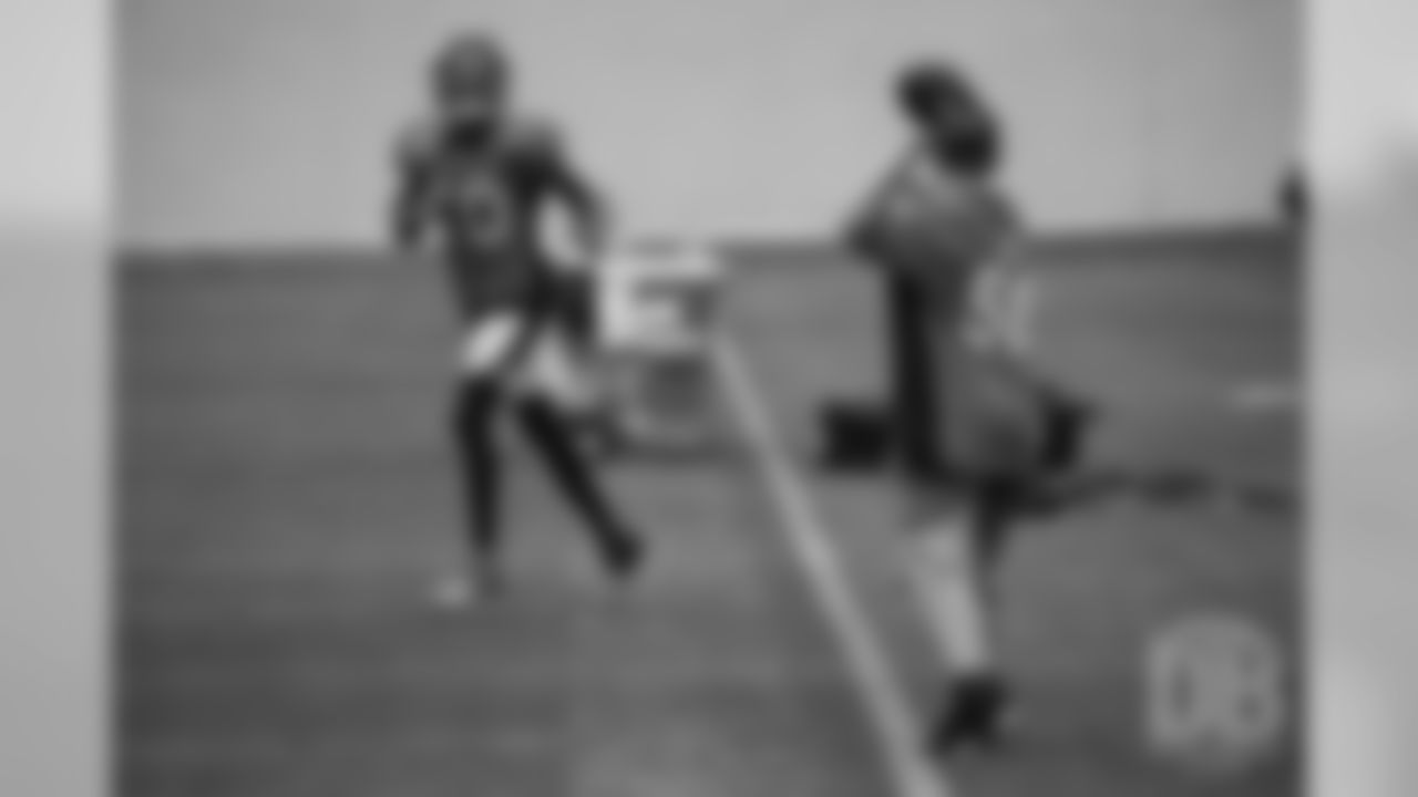 TJ, a 12-year-old fighting cystic fibrosis, wanted to be Von Miller for a day, and the Make-A-Wish Foundation helped make that dream come true on September 29, 2018. Here, TJ helps Emmanuel Sanders at practice by playing catch.