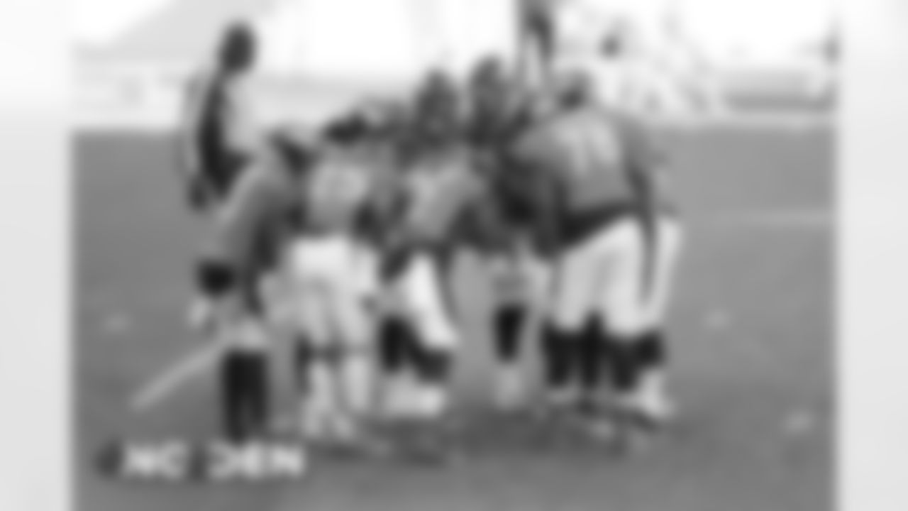 The offense huddles during the Broncos' Week 12 game against the New Orleans Saints at Empower Field at Mile High on November 29, 2020. (Photo by Gabriel Christus)