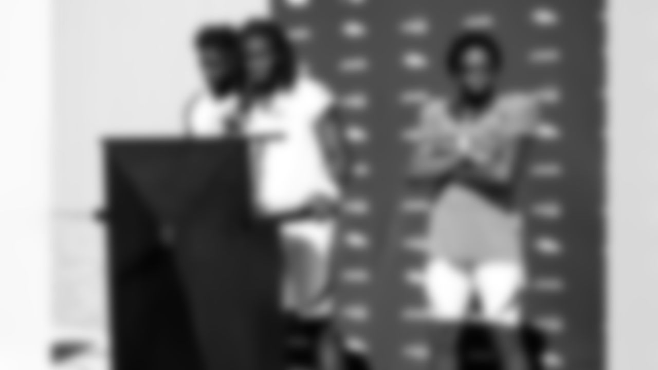 Jerry Jeudy talks during a press conference with Melvin Gordon III and KJ Hamler at his side as bodyguards after a joint practice with the Minnesota Vikings amid training camp at TCO Performance Center on August 12, 2021. (Photo by Ben Swanson)