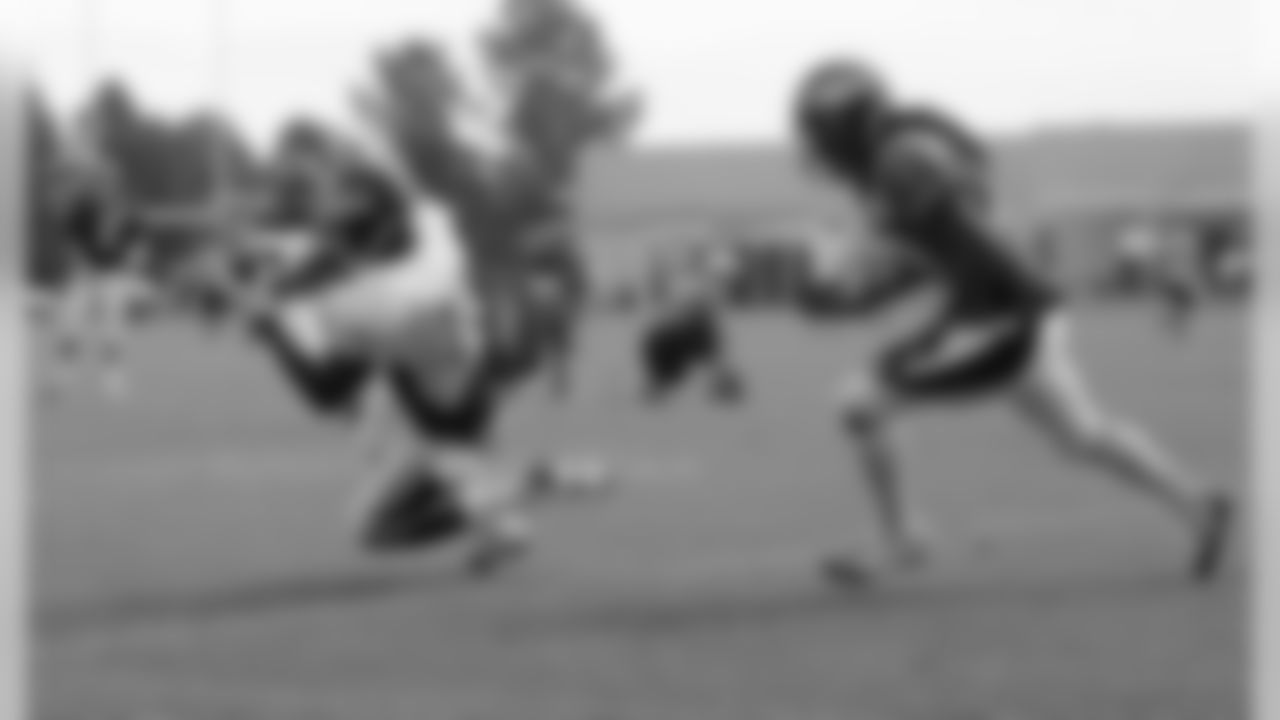 Robinson goes to the ground to catch a pass.