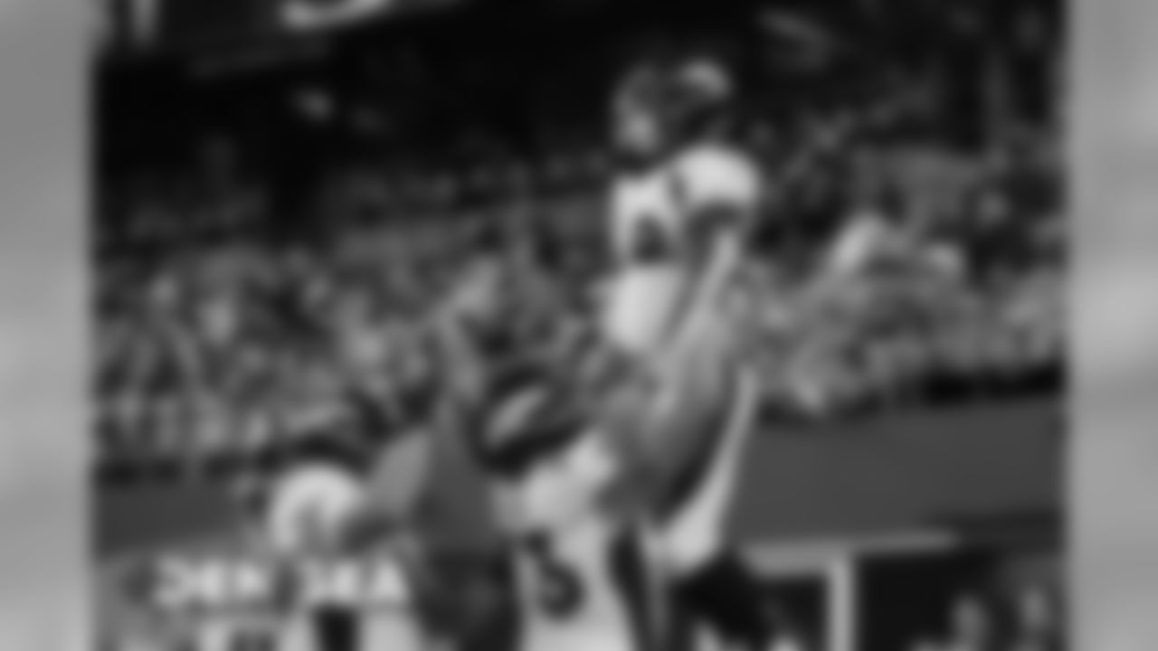 John Leglue lifts up Devontae Jackson after a touchdown during the second half of a preseason game against the Seattle Seahawks at CenturyLink Field in Seattle on August 8, 2019.