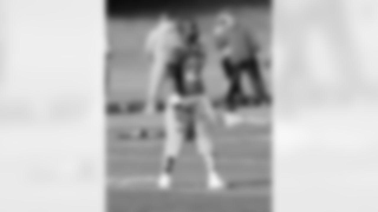 CB Tracy Porter shows his Broncos spirit with a unique pair of socks.