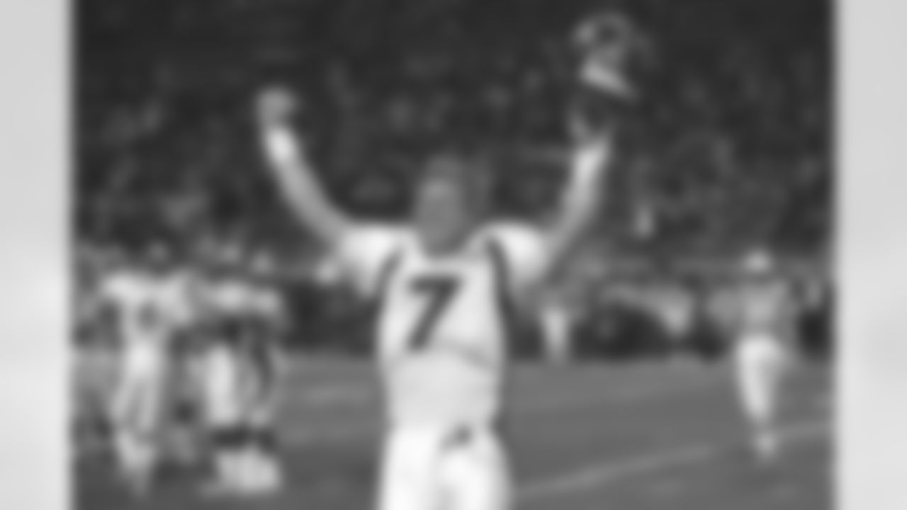 John Elway walks off the field during Super Bowl XXXIII in what was his last game in an illustrious career against the Atlanta Falcons at Pro Player Stadium in Miami, FL on January 31, 1999. He earned Super Bowl MVP honors with 336 passing yards, one passing touchdown and one rushing touchdown.