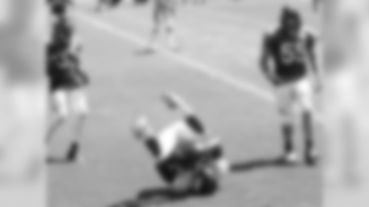Green goes to the ground to catch a TD pass.