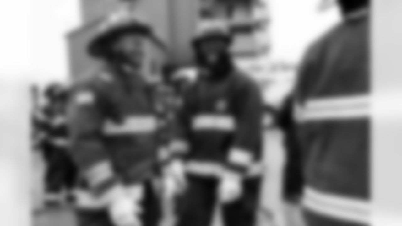 Malik Reed and McTelvin Agim visit the Denver Fire Academy on November 2, 2021 in recognition of First Responders Appreciation Day.