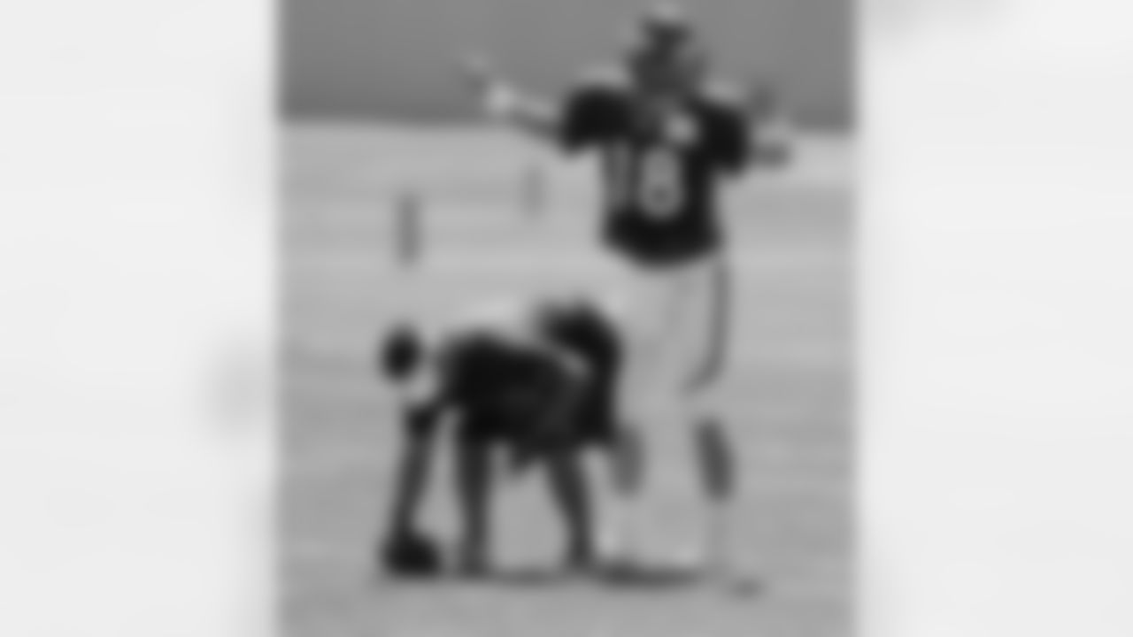 Manning signals before the snap.