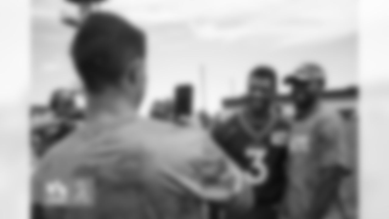 Russell Wilson during a USAA Salute to Service meet-and-greet session after practice at UCHealth Training Center in Englewood, Colorado on August 25, 2022. (Photo by Ben Swanson)