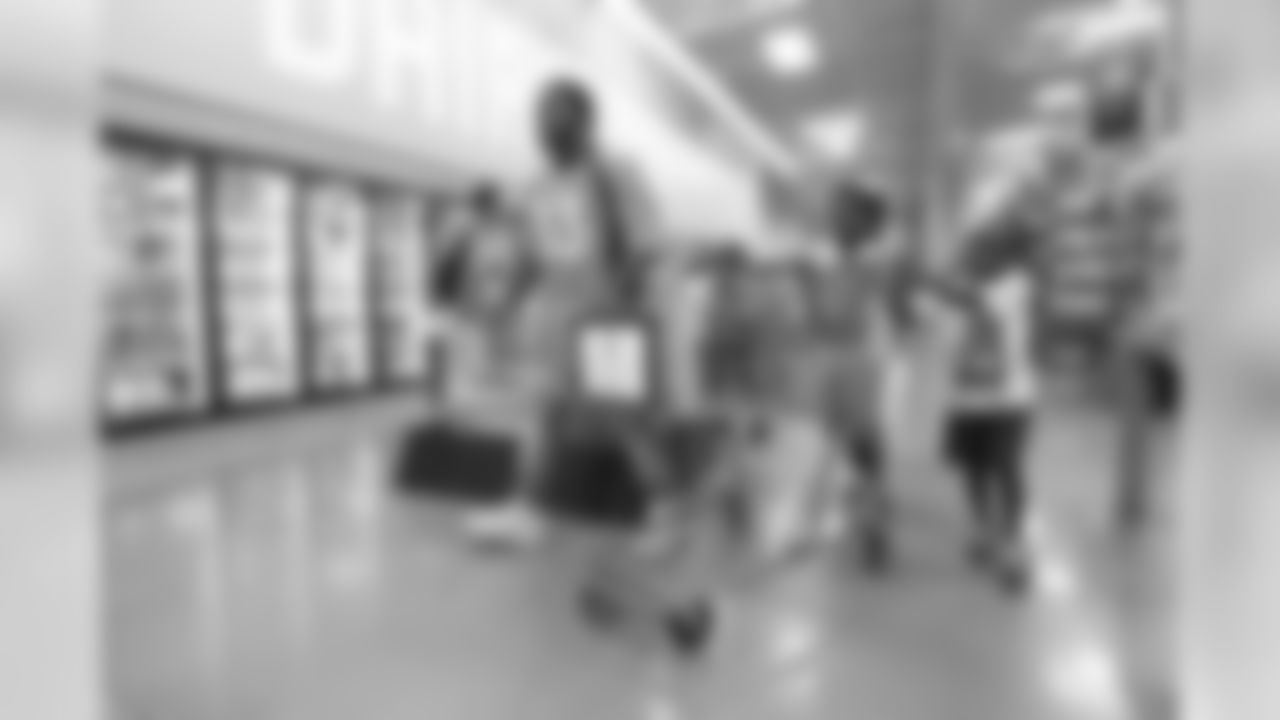 Running back De'Angelo Henderson Sr. (33) at the 2018 Back to School with the Broncos shopping spree on July 23, 2018. Each student received $100 for school supplies.