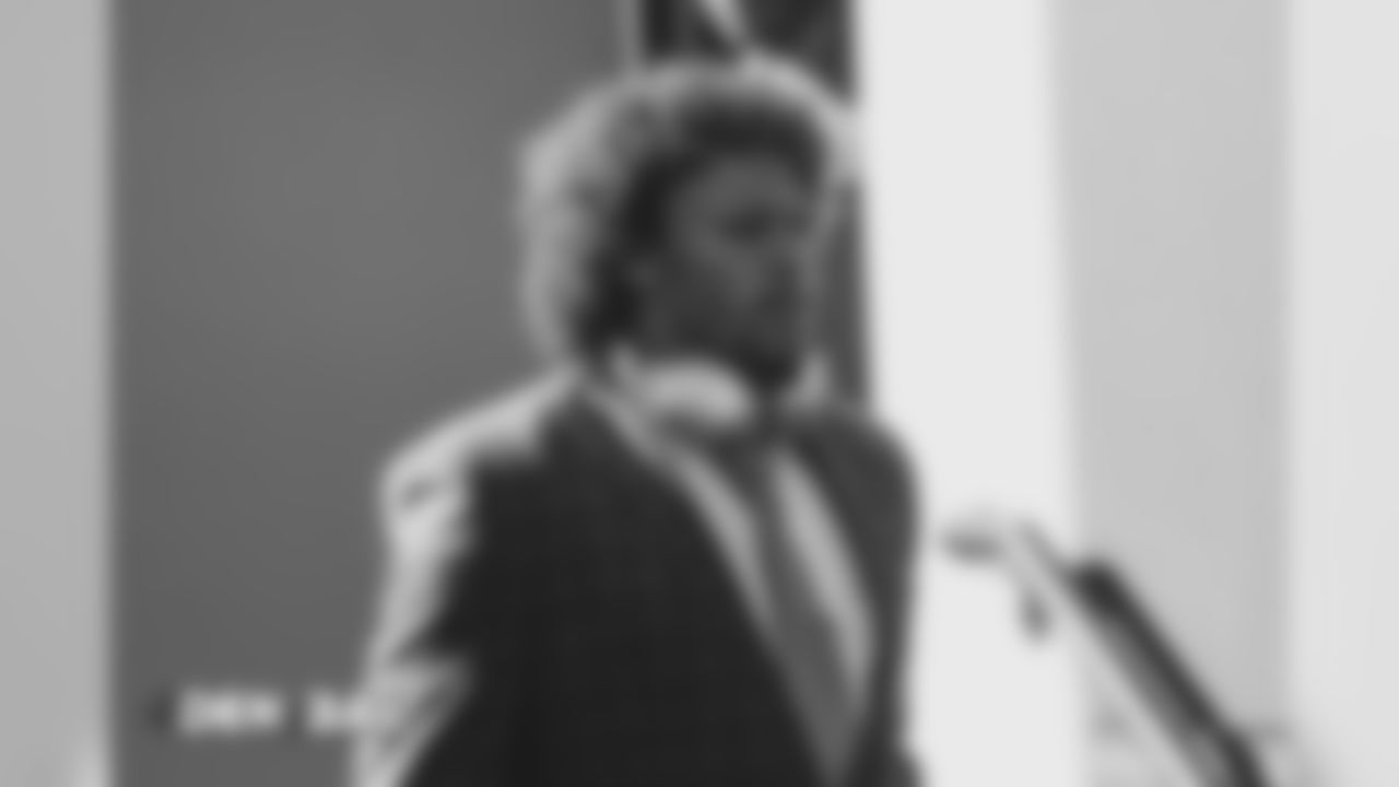 Phillip Lindsay walks to the buses during the team's travel for their Week 3 game against the Baltimore Ravens on September 22, 2018.