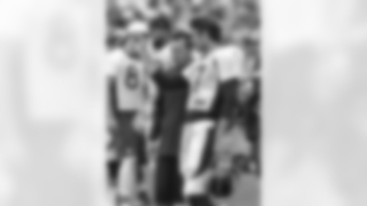 Denver Broncos quarterback Brock Osweiler (17) talks strategy with Head Coach Gary Kubiak at Denver Broncos training camp August 3, 2015 at the UCHealth Training Center in Englewood,CO.