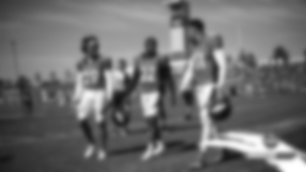 Bryce Callahan, Kareem Jackson and Justin Simmons during practice on Day 7 of training camp on July 25, 2019.