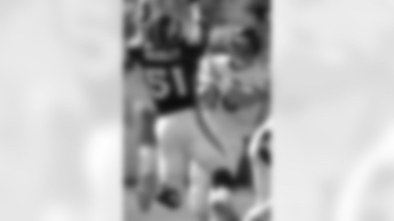 John Mobley moves in to make a play against the Baltimore Ravens at Invesco Field at Mile High in Denver, CO on September 30, 2001.