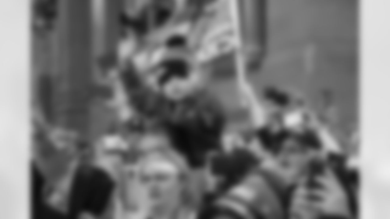 Fans cheer during the Denver Broncos Super Bowl 50 Championship Parade. Tuesday, February 9, 2016.