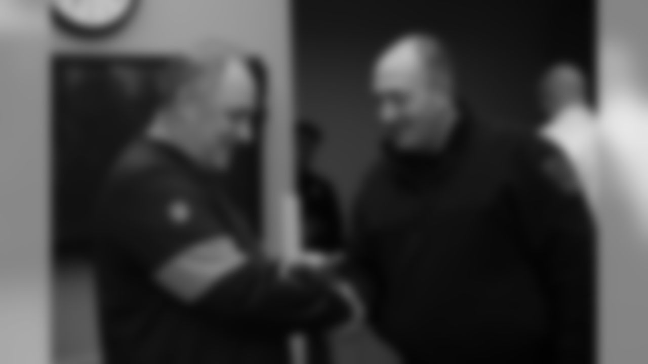 Head Coach Vic Fangio receives a patch and challenge coin from Sheriff Tyler Brown during Fangio's visit to the Arapahoe County Sheriff's Office as part of Random Acts of Kindness Week on February 20, 2020 in Centennial, Colorado. (Photo by Ben Swanson/DenverBroncos.com)