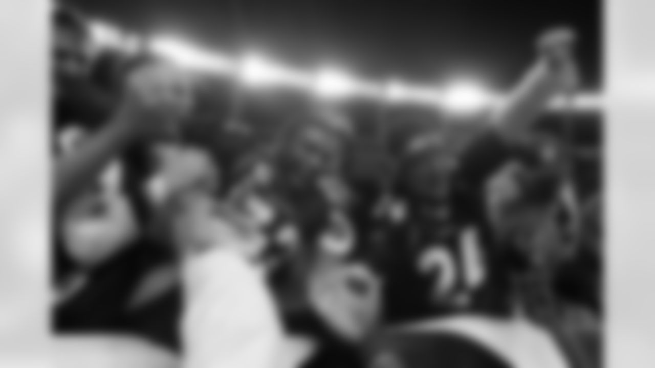 Wesley Woodyard celebrates with fans after the game against the New York Jets on November 17, 2011 at Sports Authority Field at Mile High in Denver, CO..