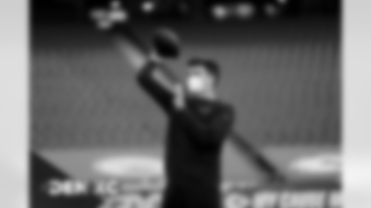 Drew Lock warms up before the Broncos' Week 13 game against the Kansas City Chiefs at Arrowhead Stadium in Kansas City, Missouri. (Photo by Gabriel Christus)