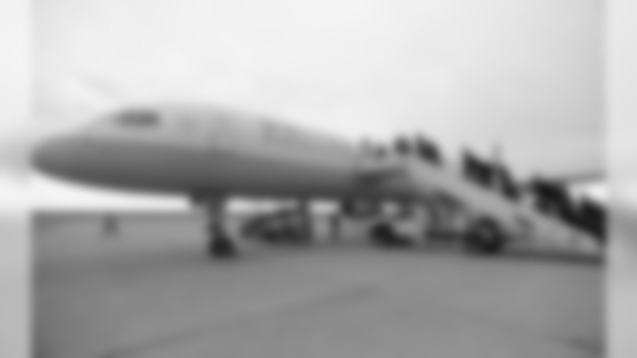 Players Board the Plane