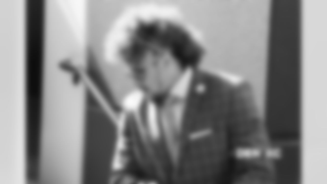 Phillip Lindsay walks to the buses during the team's travel for their Week 8 game against the Kansas City Chiefs on October 27, 2018.