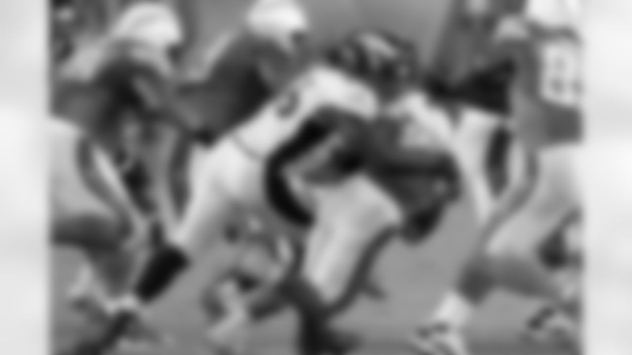 The second-year linebacker makes a tackle near the line of scrimmage.