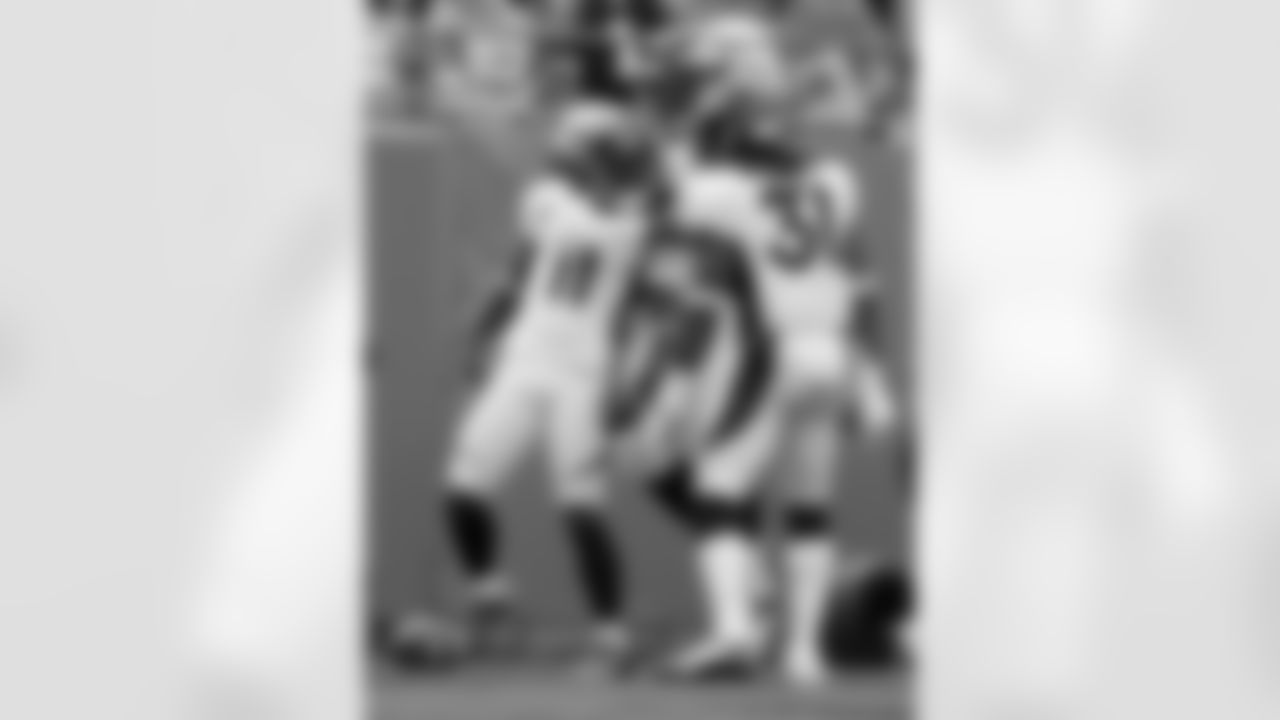 Trindon Holliday returns a punt 76 yards for a touchdown at Carolina.