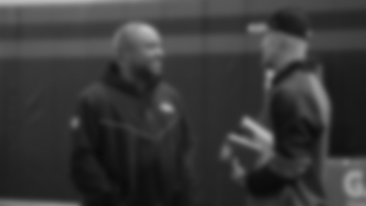 Running Backs Coach Curtis Modkins talks with a high school coach at the ninth annual High School Football Coaches Clinic hosted by the Broncos for 190 coaches from 54 different schools on May 8, 2019.