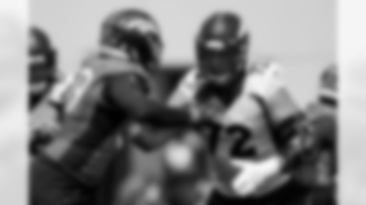 Garett Bolles and Malik Reed during practice on the 14th day of training camp at UCHealth Training Center on August 16, 2021. (Photo by Ben Swanson)