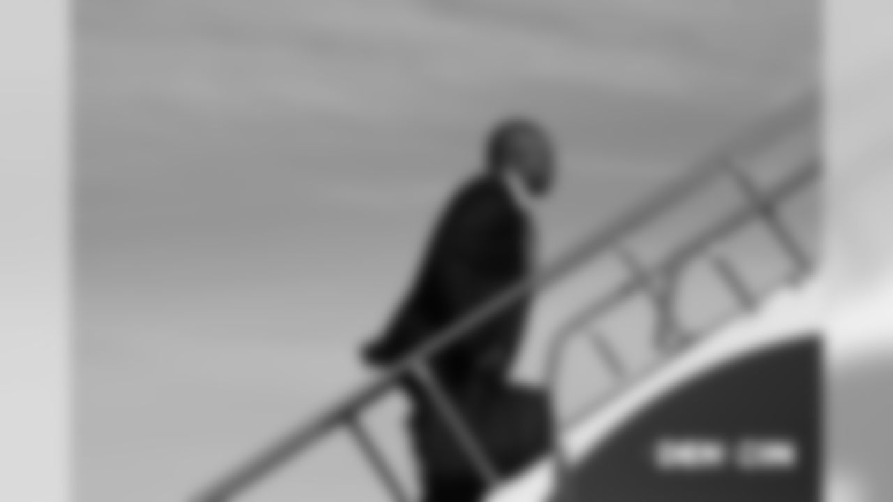 Head Coach Vance Joseph on the tarmac before the flight during the team's travel for their Week 13 game against the Cincinnati Bengals on December 1, 2018. Photo by Gabriel Christus