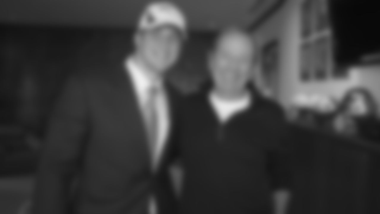 Draft pick Tim Tebow is greeted by President and CEO Pat Bowlen after Tebow arrives at Dove Valley headquarters in Englewood,CO April 23, 2010.