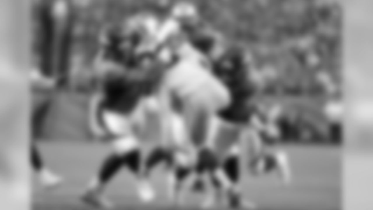 Defensive end Derek Wolfe (95)