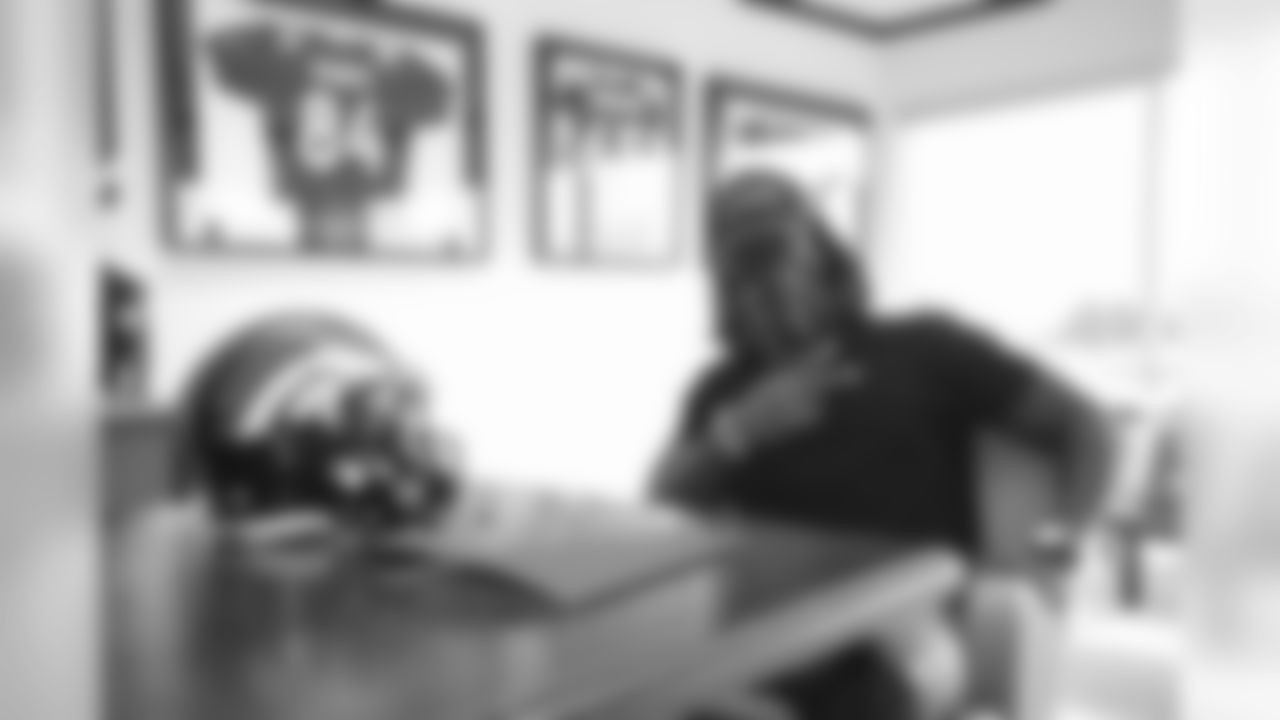 Jerry Jeudy signs his rookie contract in Pat Bowlen's conference room at UCHealth Training Center on July 27, 2020. (Photo by Ben Swanson)